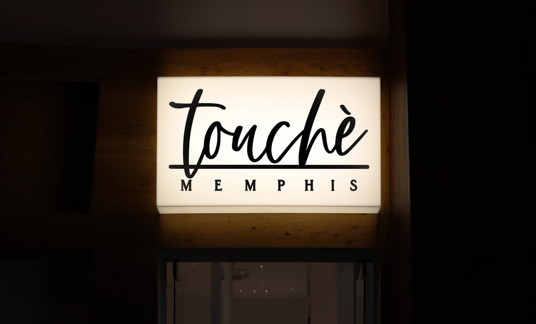 Business signage for Aisha