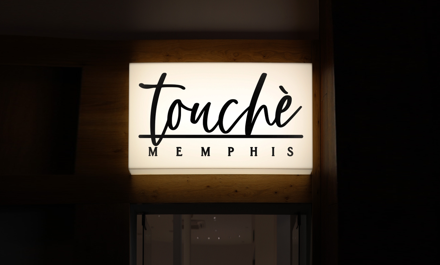 Business signage for Aisha