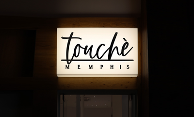 Business signage for Aisha